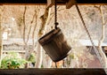 Old antique Water well wooden bucket with rope Royalty Free Stock Photo