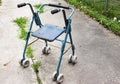 An old antique wheeled walker used for disabilities.