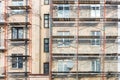 Old apartment building wall under reconstruction Royalty Free Stock Photo