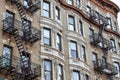 Old apartment facades, with fire stairs. Soho, Manhattan. NYC Royalty Free Stock Photo