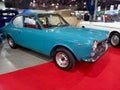 Old aqua blue 1972 Fiat 125 Sport coupe fastback berlinetta. Exhibit hall. Classic car show