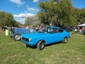 Old aqua blue 1972 Fiat 125 Sport coupe fastback berlinetta on the lawn. Classic car show Royalty Free Stock Photo