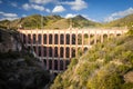 Old aqueduct named El Puente del Aguila in Nerja, Costa del Sol, Andalusia, Spain Royalty Free Stock Photo