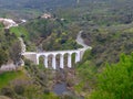 Old arch bridge over the Rio Guadiana in Mertola, Alentejo Portugal