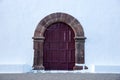 Old arch wooden door of a church