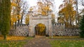 Old arched brick gate in the Park of Sigulda in Latvia. Beautiful autumn in Sigulda