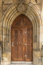 Old arched secret door in a medieval castle
