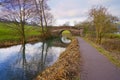 Old arched stone bridge across the Cromford Canal in Derbyshire Royalty Free Stock Photo