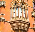 old architecture in london england windows and brick exterior wa Royalty Free Stock Photo