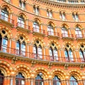 old architecture in london england windows and brick exterior Royalty Free Stock Photo