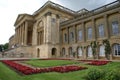 Old architecture with a pediment, columns, & balustrade