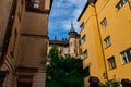 Old architecture tower building medieval city street of Lviv Ukraine Europe historical town center landmark view foreshortening