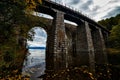 Old archy stone bridge at Transsiberian railway at Baikal lake in autumn Royalty Free Stock Photo