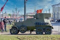 Old armored car fromSecond World War against the background city landscape