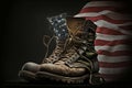 Old army combat boots stand against the background of the American flag. Memorial Day, remembering the fallen soldiers Royalty Free Stock Photo