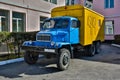 Old army military troop transport truck in mud