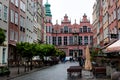 The Old Arsenal building, rebuilt after the war in medieval Dutch style, on Historical Mariacka street in Gdansk, Poland Royalty Free Stock Photo