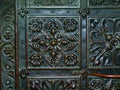 Aged green copper & bronze color plated door detail