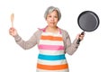 Old asian housewife holding up wooden ladle and frying pan Royalty Free Stock Photo