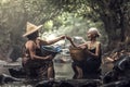 Old Asian woman working in cascade Royalty Free Stock Photo