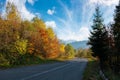 Old asphalt road in mountains. beautiful autumn scenery on a sunny day Royalty Free Stock Photo