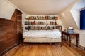 Old attic furnished bedroom