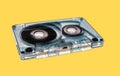 old audio cassette tape on yellow background Royalty Free Stock Photo