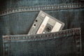 Old Audio Tape Cassette in the Jeans Royalty Free Stock Photo