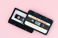 Old audio tape cassettes on a pink background. Top view, old technology concept Royalty Free Stock Photo