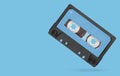 Old audio tape compact cassette with blank label Royalty Free Stock Photo