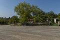 Old authentic bus station with exterior bench in the center of village Paunovo, Sredna Gora mountain Royalty Free Stock Photo