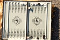 Old backgammon game in the sun closeup,gambling Royalty Free Stock Photo