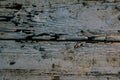 Old background, cracked surface, paint with scratches, wet painted wood and boards. Royalty Free Stock Photo