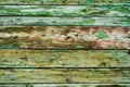 Old background, cracked surface, paint with scratches, wet painted wood and boards. Royalty Free Stock Photo
