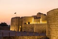 Old Bahrain Fort at Seef at sunset Royalty Free Stock Photo