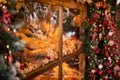 Old bakery window on christmas eve. Freshly baked bread and rolls are sold in bakery window. Showcase with traditional french Royalty Free Stock Photo