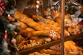 Old bakery window on christmas eve. Freshly baked bread and rolls are sold in bakery window. Showcase with traditional french Royalty Free Stock Photo