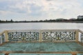 Old balcony with beautiful fence over the lake