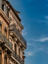 Old balconys and cloudy sky in Toulouse France