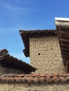 Old Balkan house clay wall. Vintage village clay bricks wall