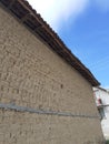 Old Balkan house clay wall. Vintage village clay bricks wall Royalty Free Stock Photo