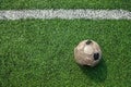 Old ball on new ground Royalty Free Stock Photo