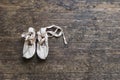 Old ballet shoes on old wooden floor. Royalty Free Stock Photo