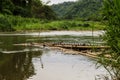 Old bamboo raft in river Royalty Free Stock Photo