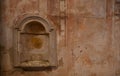 The old baptismal font of a church