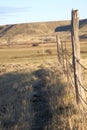 Old Barbed Wire Fence line Royalty Free Stock Photo