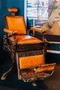 Old barber chair in a room Royalty Free Stock Photo