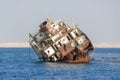 An old barge at the sea