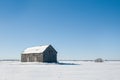 Old barn alone in the winter