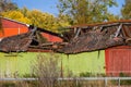 Old barn with a collapsing rood.. Royalty Free Stock Photo